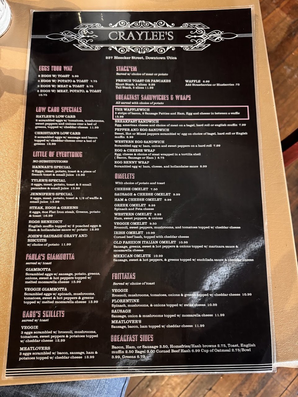 Breakfast menu page with classic egg dishes.