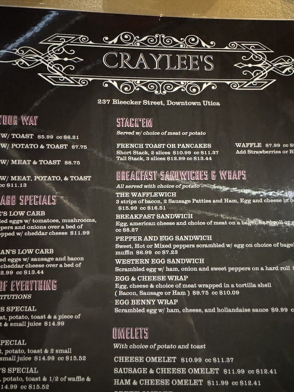 Printed breakfast menu with traditional diner choices.
